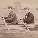Two men in a fake rowing boat